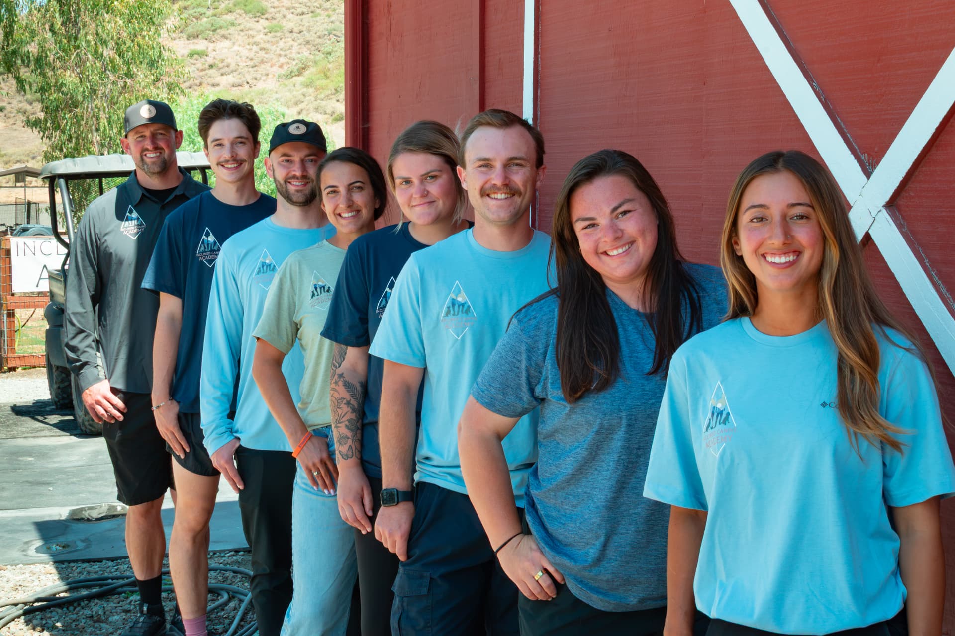 The Inclined Canine Academy team of trainers posing together at the Morgan Hill facility